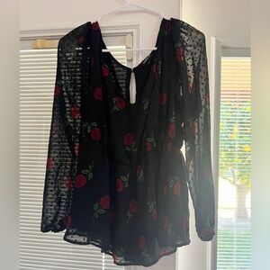 Long sleeve peplum top with rose print